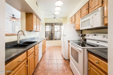 Furnished condo in an absolutely fantastic location! Situated on