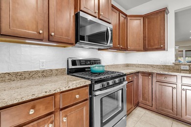 Warm, inviting, and pristinely-kept, this 2 bedrooms, 2 bath