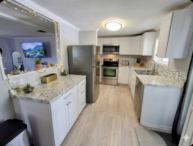 Check out this beautiful waterfront mobile home located in - photo 3