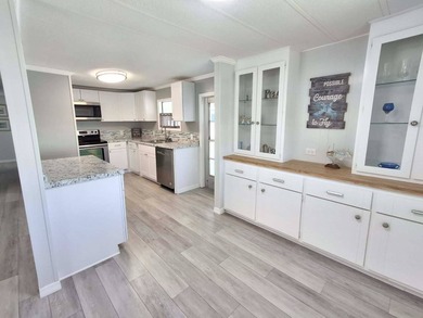 Check out this beautiful waterfront mobile home located in - photo 4