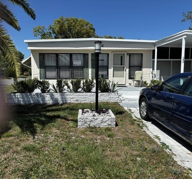 This is a spacious and furnished corner lot home that features 2 - photo 1