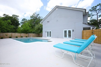 Welcome to this beautifully renovated 5-bedroom, 2.5-bath pool - photo 11