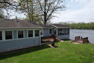 Escape to this peaceful lake home that is situated at the end of - photo 22