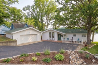Darling lakefront GEM, cherished by one family for years is now - photo 1