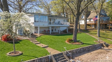 Darling lakefront GEM, cherished by one family for years is now - photo 2