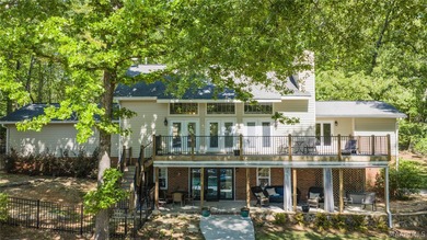 Experience refined lake living in this exceptional 5-bedroom, 3 - photo 1