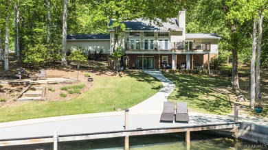 Experience refined lake living in this exceptional 5-bedroom, 3 - photo 2