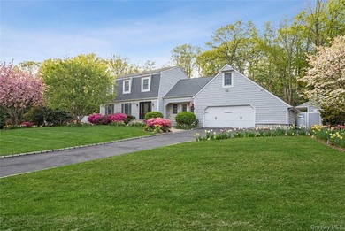 Set within the serene landscape of Rolling Woods in Riverhead - photo 2