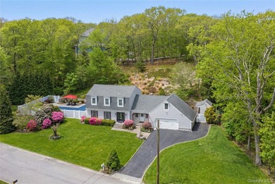 Set within the serene landscape of Rolling Woods in Riverhead - photo 3