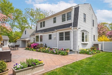 Set within the serene landscape of Rolling Woods in Riverhead - photo 5