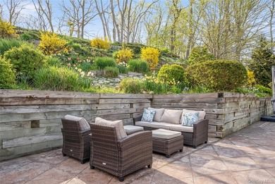Set within the serene landscape of Rolling Woods in Riverhead - photo 6