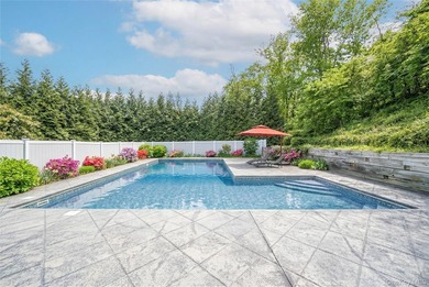 Set within the serene landscape of Rolling Woods in Riverhead - photo 8