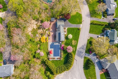 Set within the serene landscape of Rolling Woods in Riverhead - photo 10