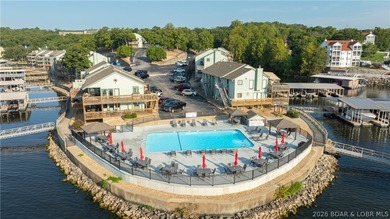 Escape to the stunning Lake of the Ozarks with this charming - photo 1
