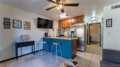 Escape to the stunning Lake of the Ozarks with this charming - photo 7