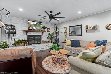 This super-cute brick home is full of charm, curb appeal, and