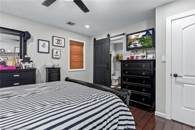 This super-cute brick home is full of charm, curb appeal, and