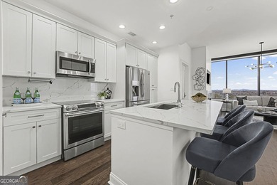 Soak in spectacular skyline views from this light-filled