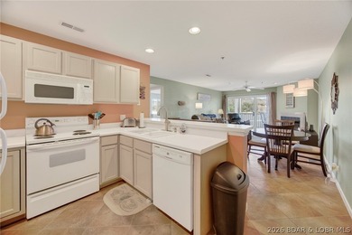 Well-maintained 3BR, 2BA end-unit condo offering added privacy - photo 3