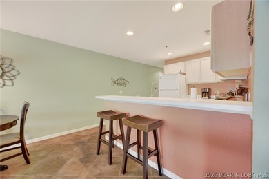 Well-maintained 3BR, 2BA end-unit condo offering added privacy - photo 5