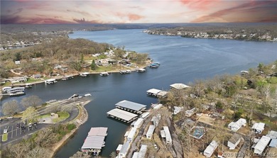 Here is a vacation home steps from the water with a nice view of - photo 1