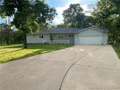 This home checks a lot of boxes: Location, blacktop to your door - photo 2