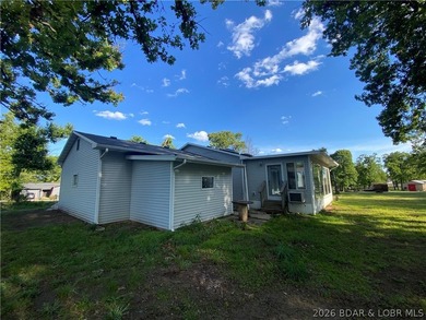 This home checks a lot of boxes: Location, blacktop to your door - photo 5