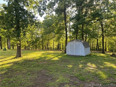 This home checks a lot of boxes: Location, blacktop to your door - photo 6