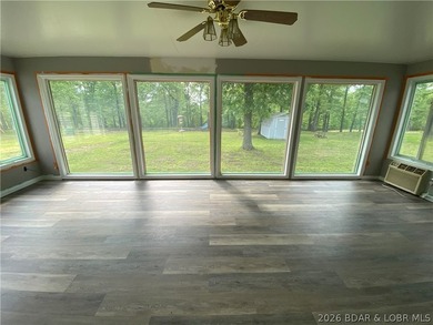 This home checks a lot of boxes: Location, blacktop to your door - photo 7