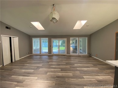 This home checks a lot of boxes: Location, blacktop to your door - photo 9