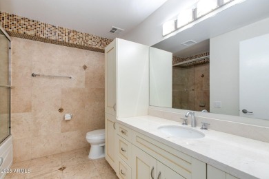 Welcome to a Rare Sky Bridge Residence at Optima Camelview