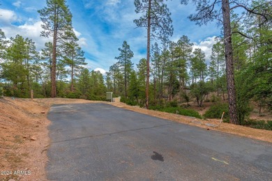 BACKING NATIONAL FOREST IN THE RIM GOLF CLUB! Nestled within the - photo 2