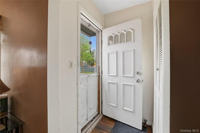 Charming brick home in tree-lined Oakland Gardens. This - photo 4