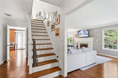 Nestled on a secluded, lushly landscaped three-quarter-acre - photo 4