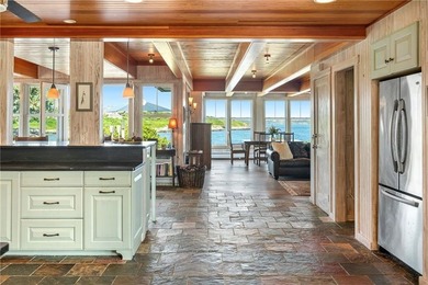 Exceptional waterfront home perched high above the water - photo 22