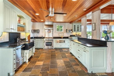 Exceptional waterfront home perched high above the water - photo 36