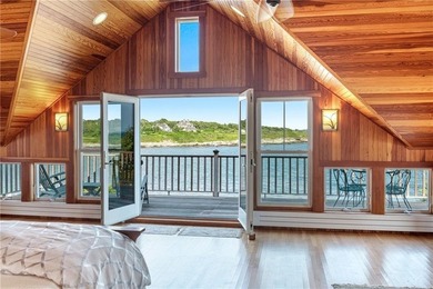 Exceptional waterfront home perched high above the water - photo 41