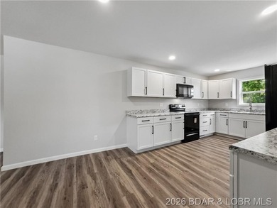 Completely rebuilt from the ground up, 5-bed, 3-bath home in - photo 8