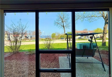Wake up to shimmering LAKE VIEWS and sunlight pouring through - photo 8