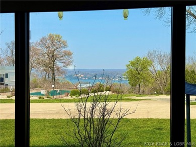 Wake up to shimmering LAKE VIEWS and sunlight pouring through - photo 9