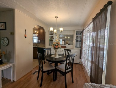 This lovely home is located in a 55+ community where you own - photo 11