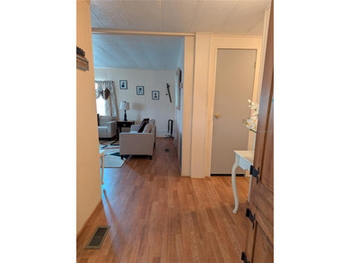 This lovely home is located in a 55+ community where you own - photo 12