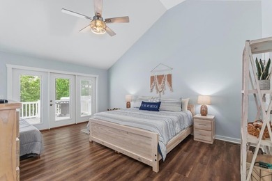 Built in 2023, this lakefront condo at Green Turtle Bay Resort & - photo 13