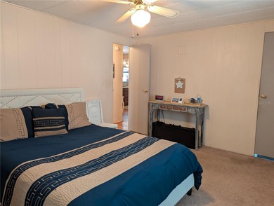 This lovely home is located in a 55+ community where you own - photo 14