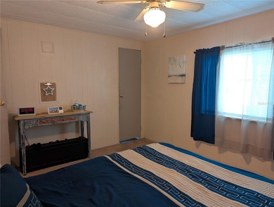 This lovely home is located in a 55+ community where you own - photo 15