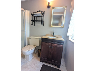 This lovely home is located in a 55+ community where you own - photo 17