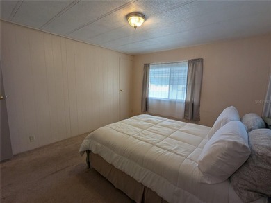 This lovely home is located in a 55+ community where you own - photo 21