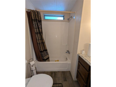 This lovely home is located in a 55+ community where you own - photo 23