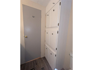 This lovely home is located in a 55+ community where you own - photo 24
