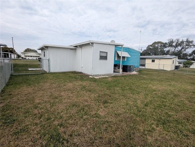 This lovely home is located in a 55+ community where you own - photo 29